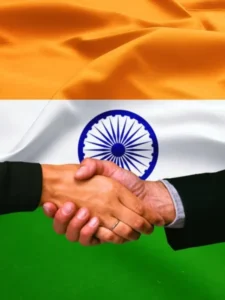 depositphotos_359656050-stock-photo-business-handshake-india-flag-background